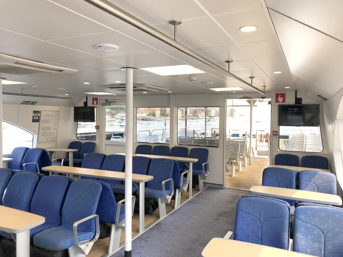 a room filled with furniture and a blue chair