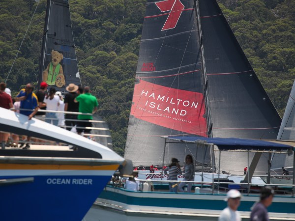 a group of people on a boat in the water