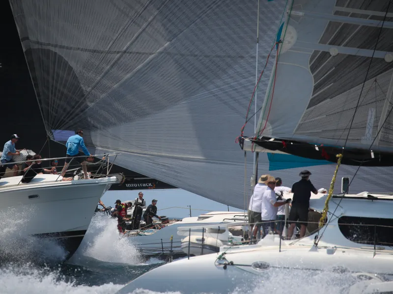 a group of people on a boat in the water