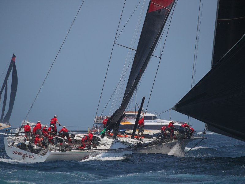 a group of people on a boat in the water
