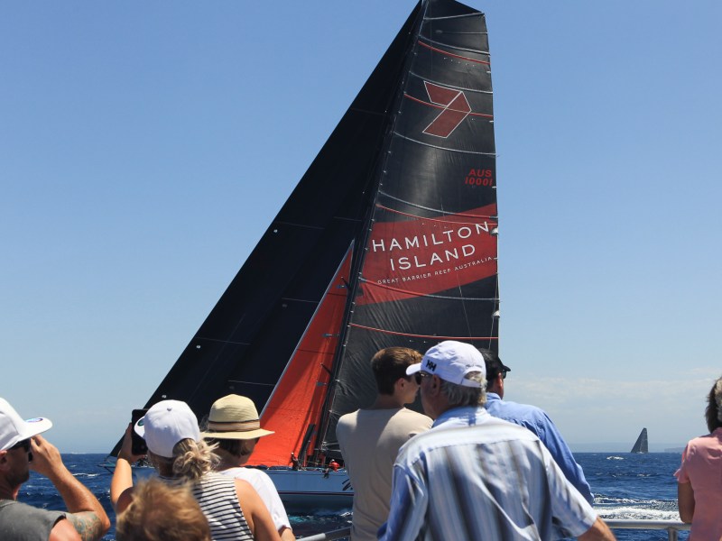 a group of people standing in front of a crowd