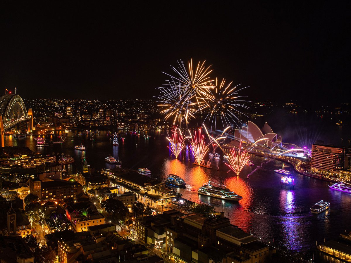 a view of a city street filled with traffic at night