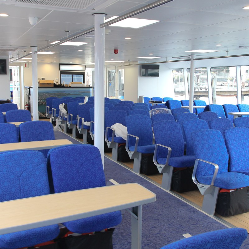 a room filled with furniture and a blue chair