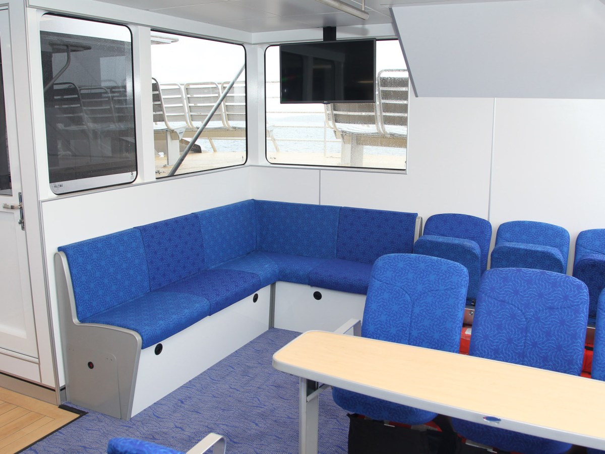 a blue chair in a room