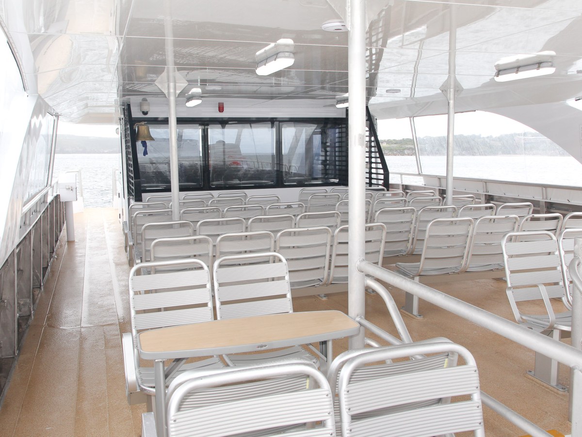 a chair sitting in front of a building