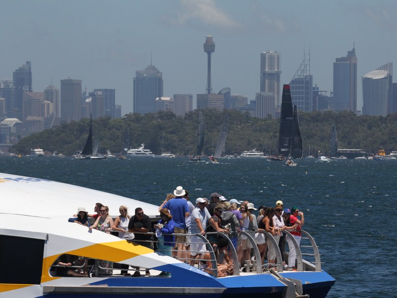 a group of people in a boat on a body of water