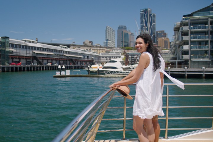 a person standing in front of water