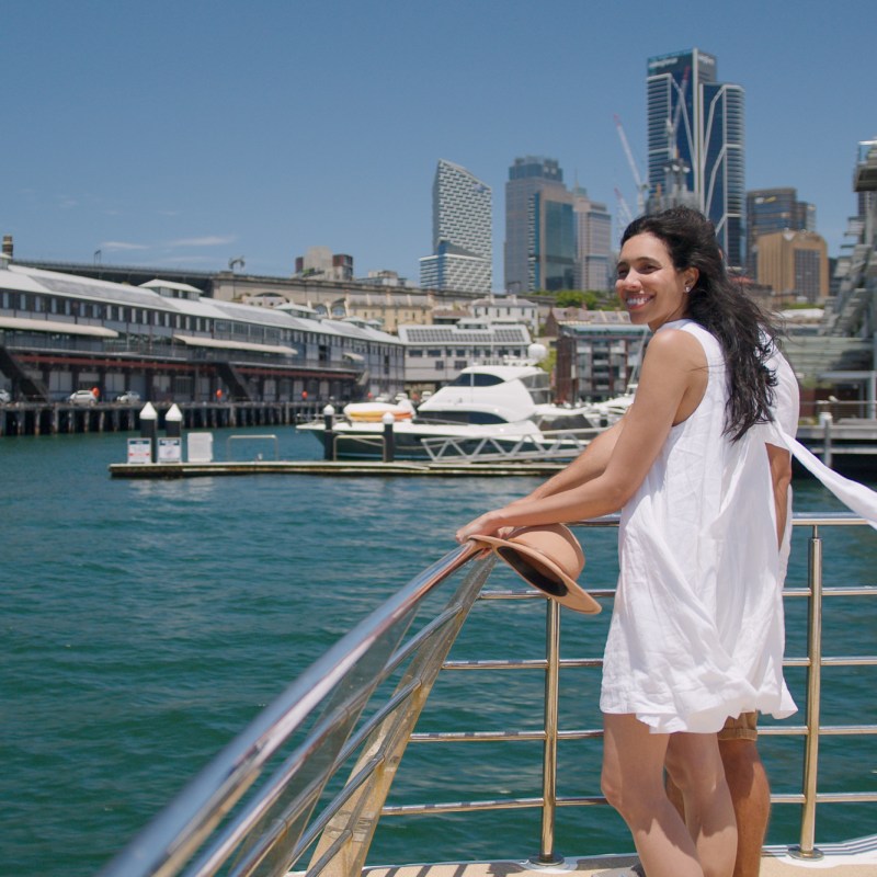 a person standing in front of water