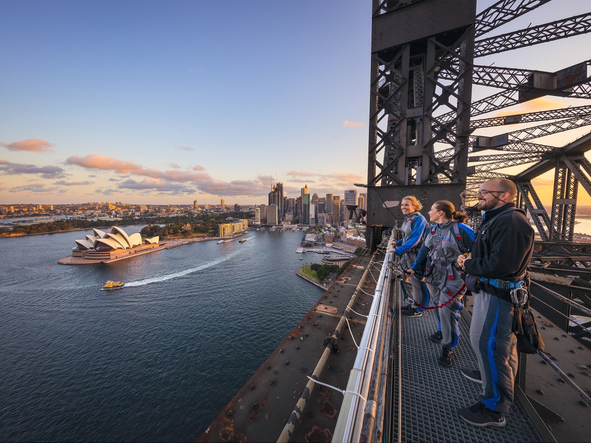 a group of people on a bridge