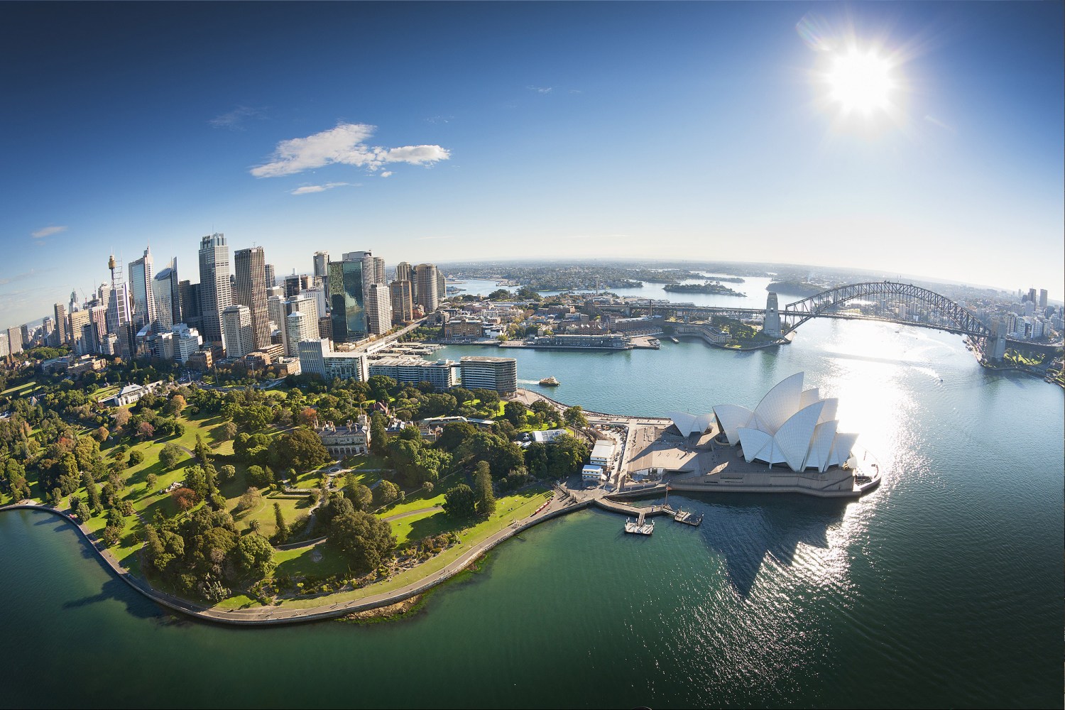 a view of a large body of water with a city in the background