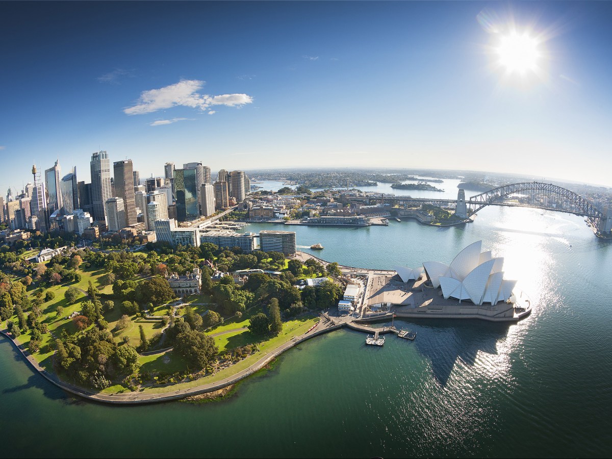a view of a large body of water with a city in the background