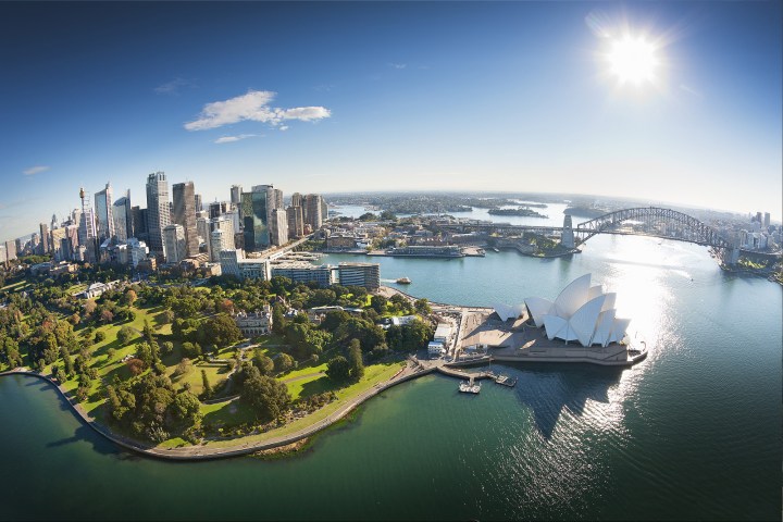 a view of a large body of water with a city in the background