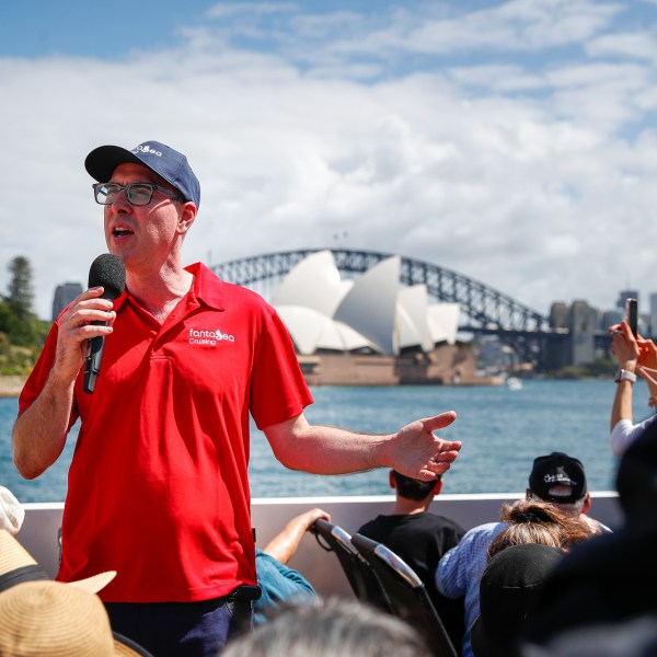 a group of people that are talking on a cell phone