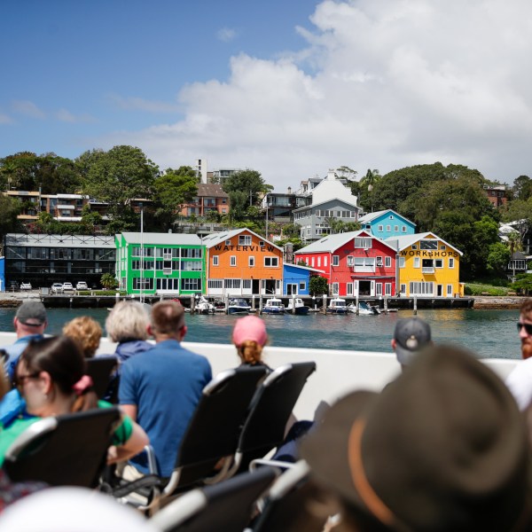 a group of people standing in front of a crowd