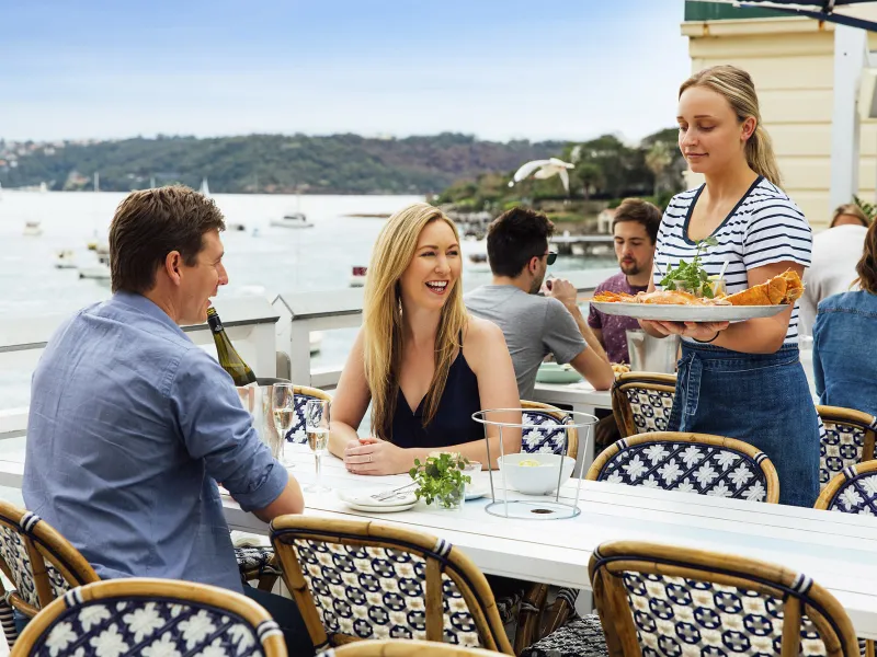 a group of people sitting at a table