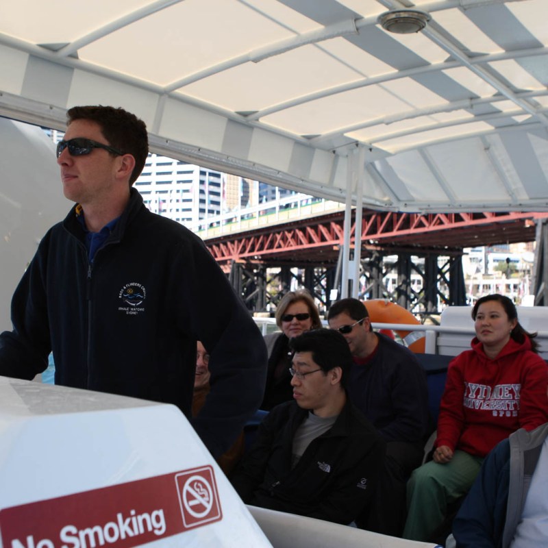 a man standing in front of a building