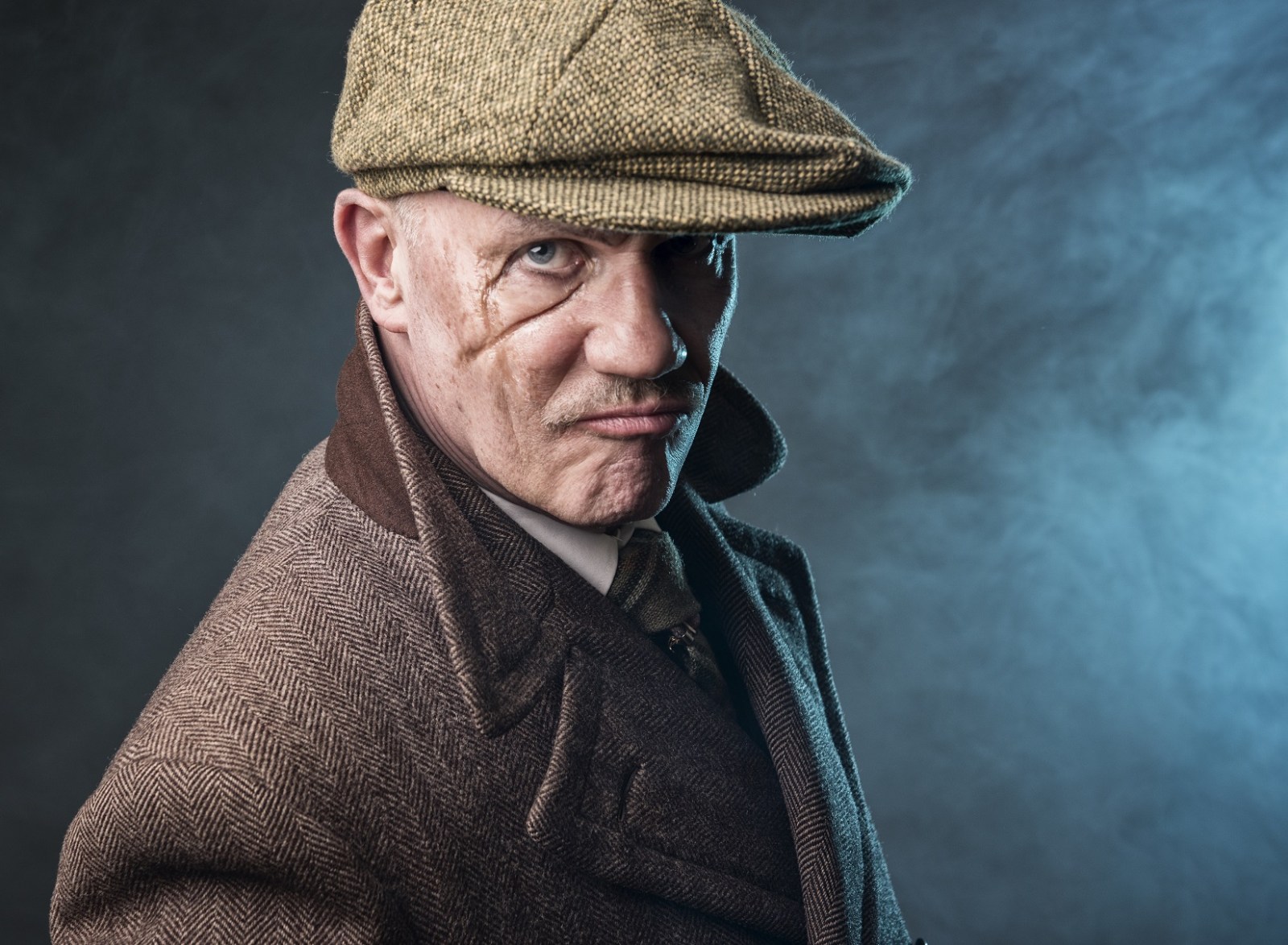 criminal a man wearing a hat