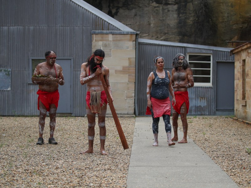a group of people standing in front of a building