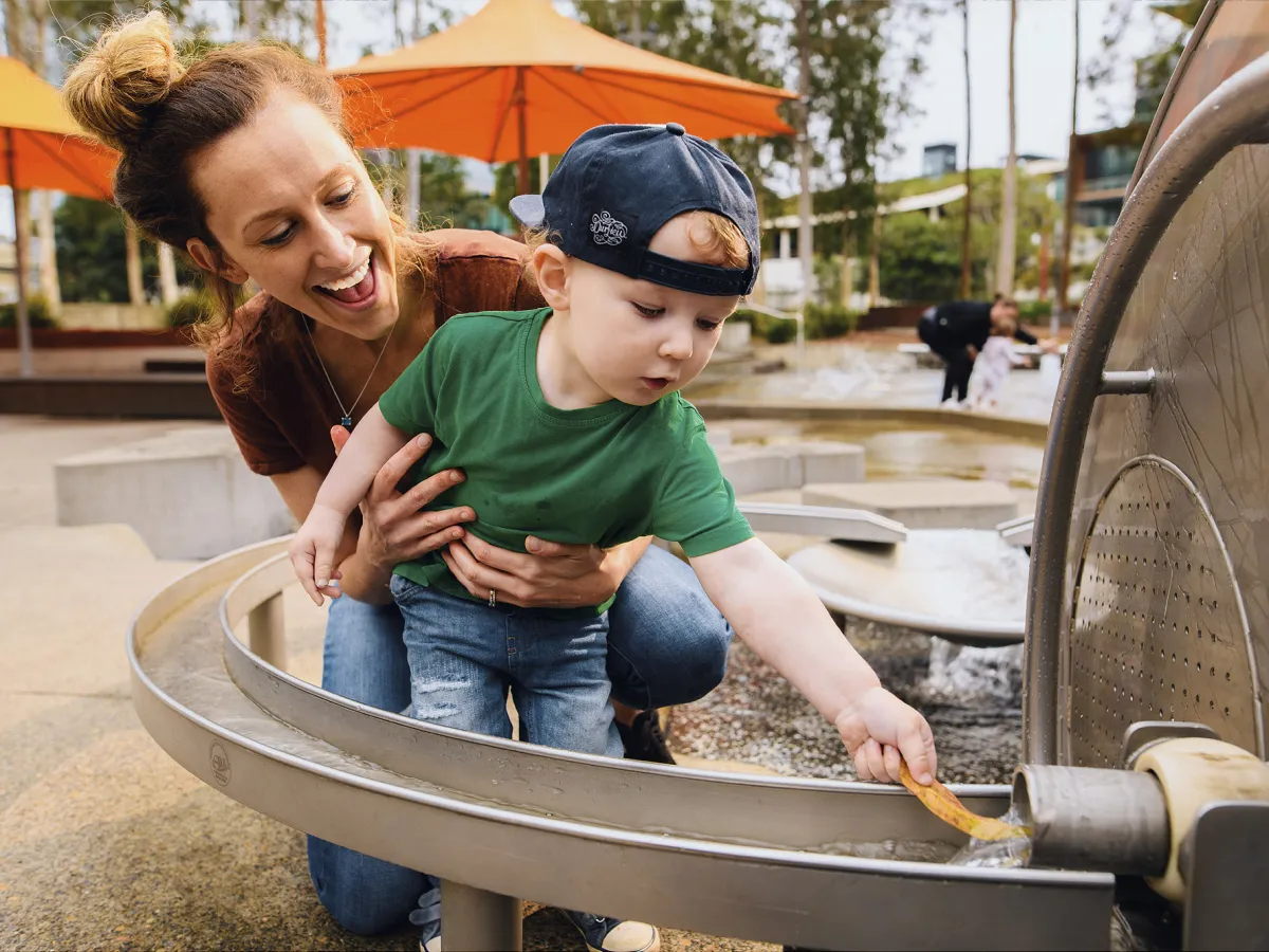 a little girl wearing a hat