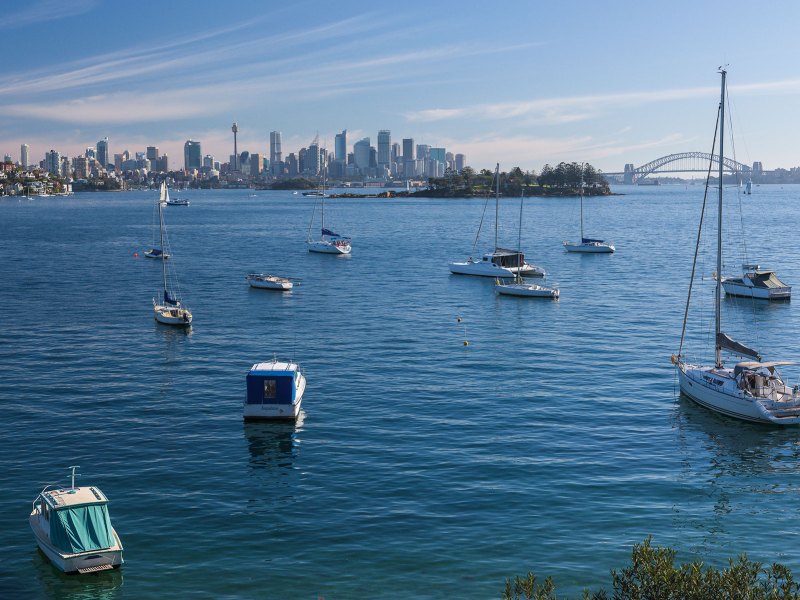 a small boat in a large body of water