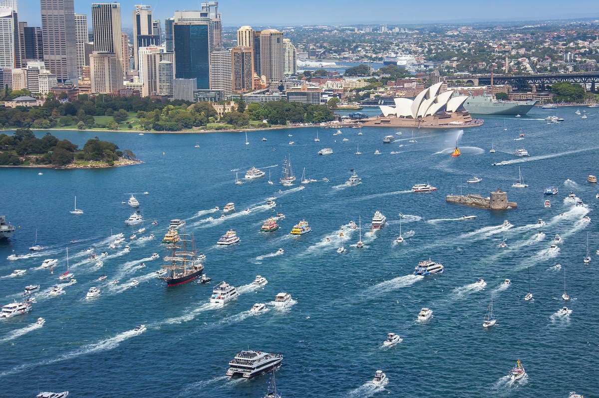harbour_parade a large body of water with a city in the background