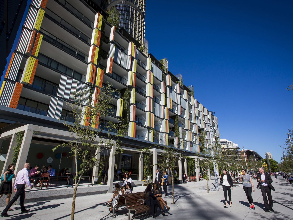 a group of people riding skis on top of a building