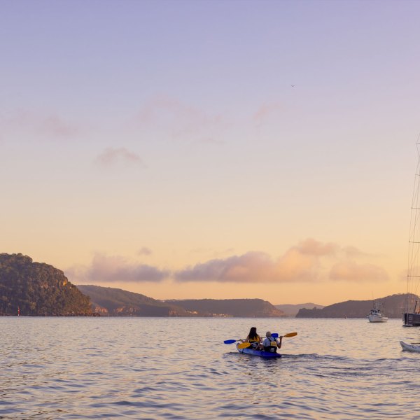 a small boat in a large body of water
