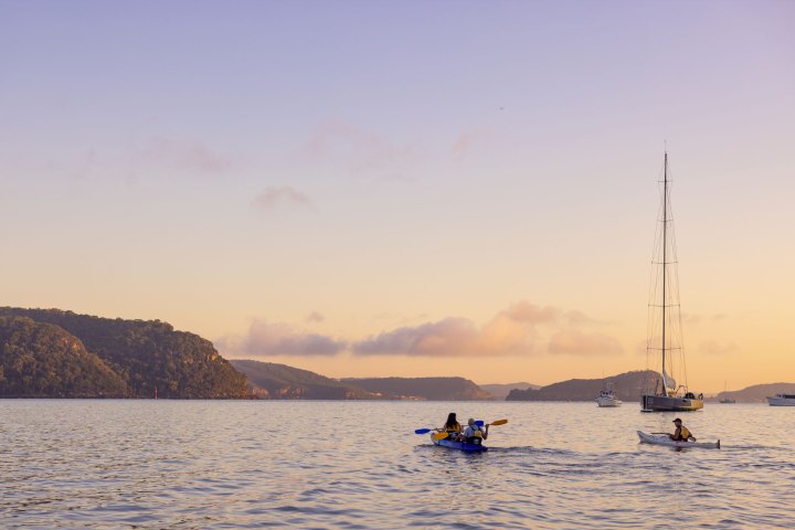 a small boat in a large body of water