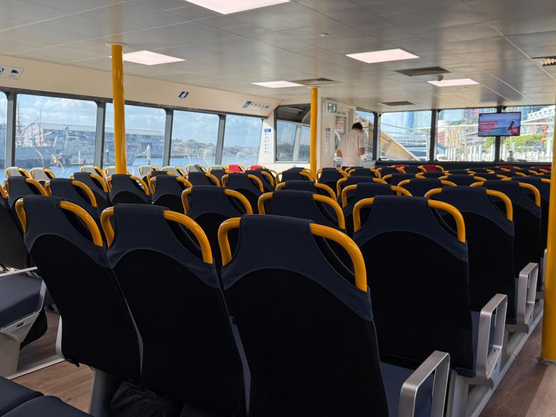 a group of people sitting at a train station