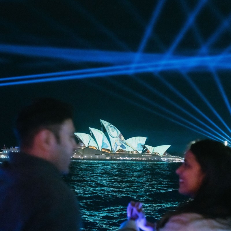 a man holding a blue umbrella